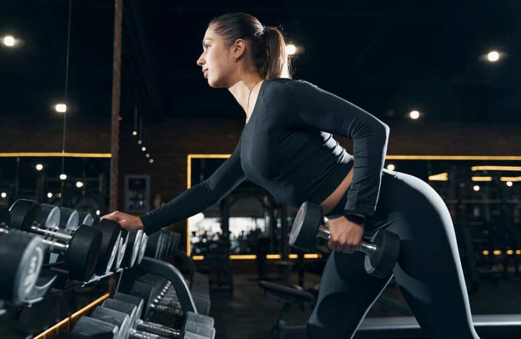 Dumbbell squats for dumbbell home workout for women.
